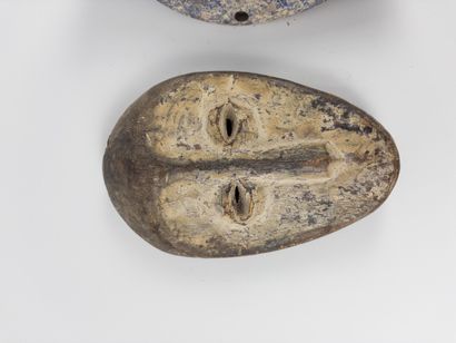 Two African masks. 
One certainly Lega (Democratic...