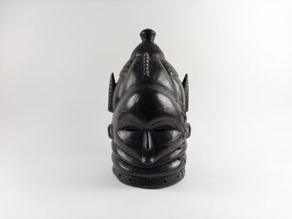 Bundu. 
Helmet mask. Blackened and incised...