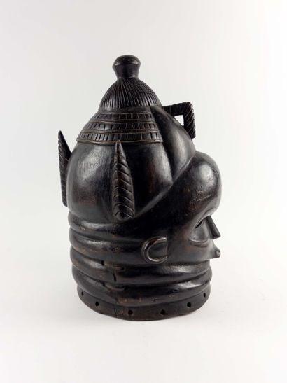 Bundu. 
Helmet mask. Blackened and incised...