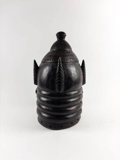 Bundu. 
Helmet mask. Blackened and incised...