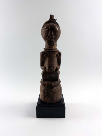 Songye. 
Janus fetish. The eyes are represented...