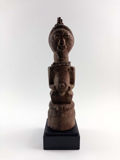 Songye. 
Janus fetish. The eyes are represented...