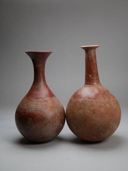 Two Djenne jars
Mali
H: 35 cm and 37 cm

These...