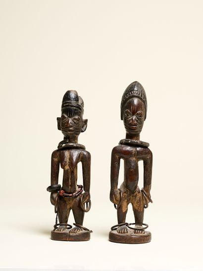 Pair of Ibedji Yoruba statuettes, Nigeria
Wood,...