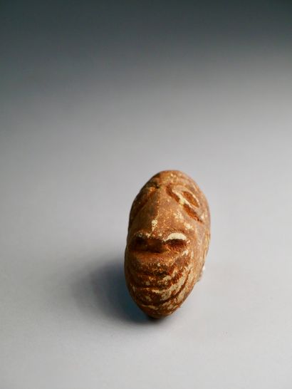 A stone head
Vanuatu
Height : 7.5 cm
Miniature...