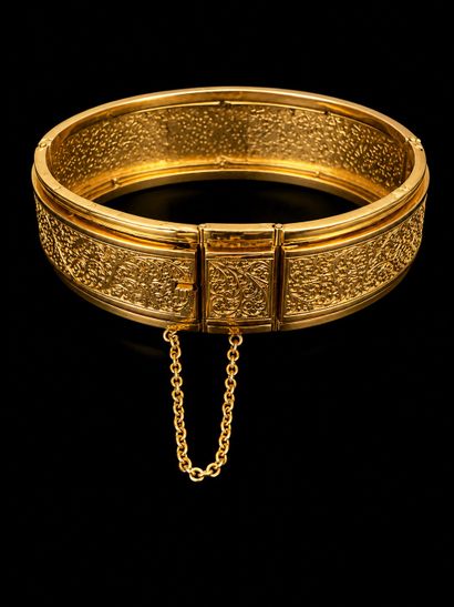 Rigid bracelet in openwork yellow gold (750...