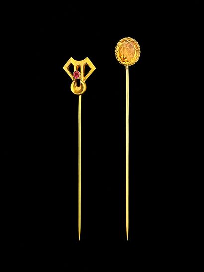 A yellow gold (750 thousandths) hatpin set...