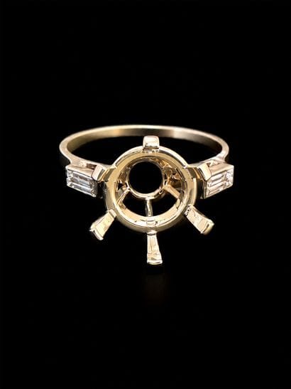 Monture de bague en platine, épaulée de deux...