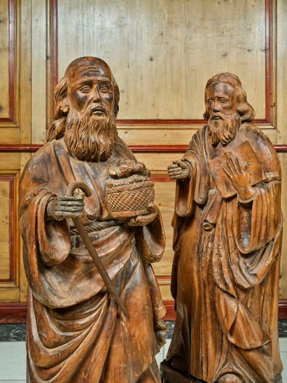 Pair of carved walnut statues representing...