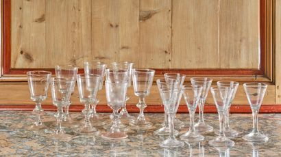 Set of seventeen antique stemmed glasses,...