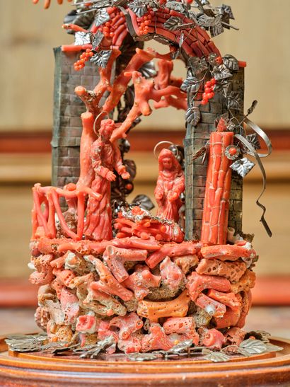 Nativity scene in red coral, silver and wood...