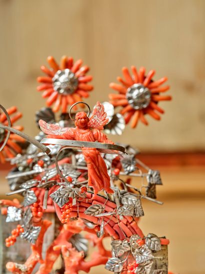 Nativity scene in red coral, silver and wood...