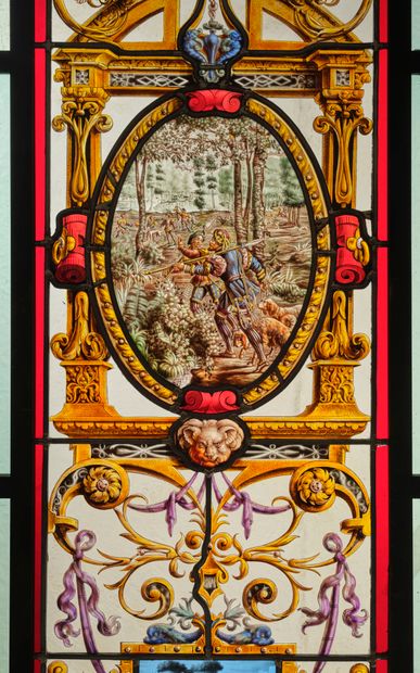 Pair of stained glass windows in polychrome...
