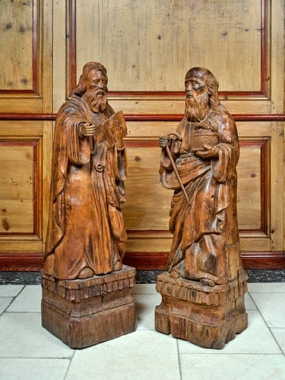 Pair of carved walnut statues representing...