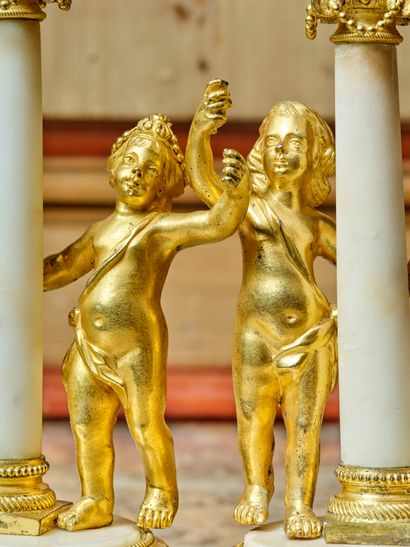 Pair of chased bronze, gilt and white marble...