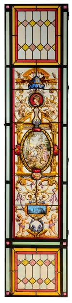 Pair of stained glass windows in polychrome...