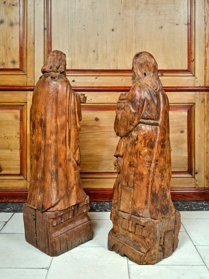 Pair of carved walnut statues representing...