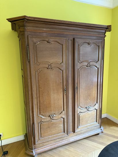 Rustic molded oak ARMOIRE, with canted jambs...