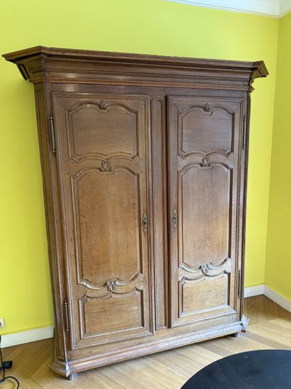 Rustic molded oak ARMOIRE, with canted jambs...
