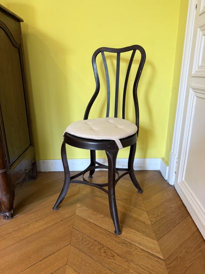 Suite of twelve CHAIRS in patinated metal,...