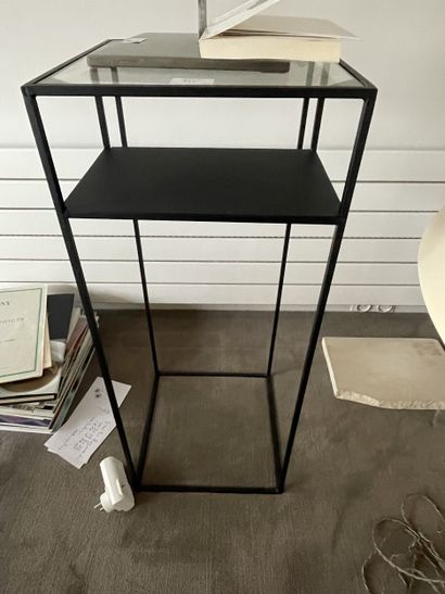 Three CONSOLES with black lacquered metal...