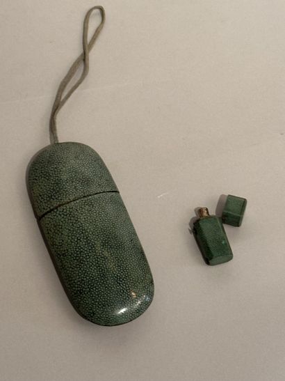 Small salt flask in a stingray case. An empty...