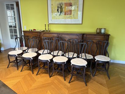 Suite of twelve CHAIRS in patinated metal,...