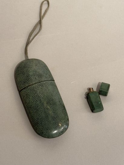 Small salt flask in a stingray case. An empty...