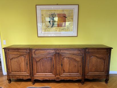 Large low rustic BUFFET in molded oak, the...