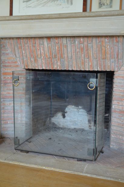 French work
Glass and brass fire screen 
Circa...