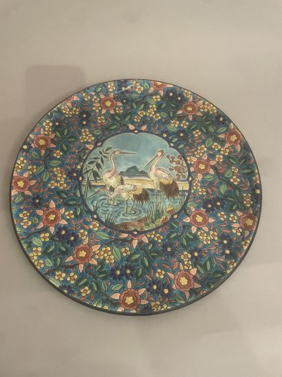 LONGWY Grand plat en émail à décor de hérons....