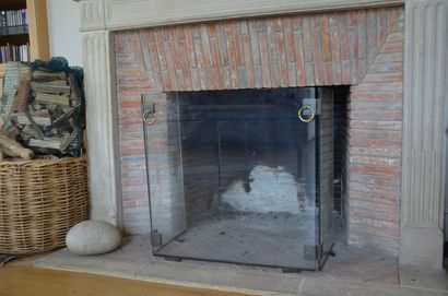 French work
Glass and brass fire screen 
Circa...