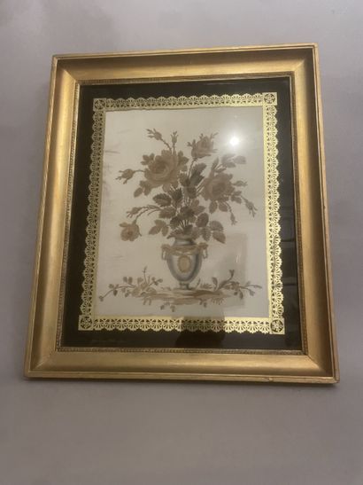 FIXE on silk decorated with a flowering vase.
...
