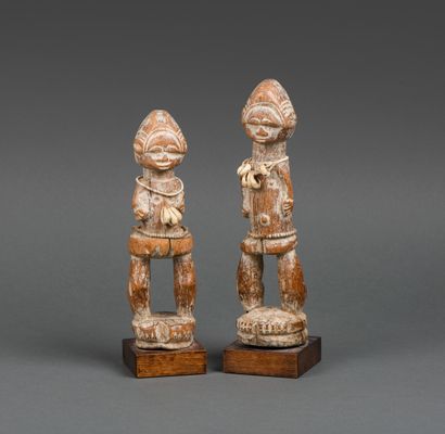 COTE D'IVOIRE - Baule couple in carved wood,...