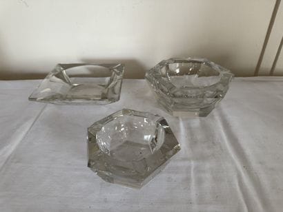 Set of three crystal ASHTRAYS, one quadrangular...