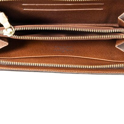 LOUIS VUITTON
Monogram canvas wallet, gilded...