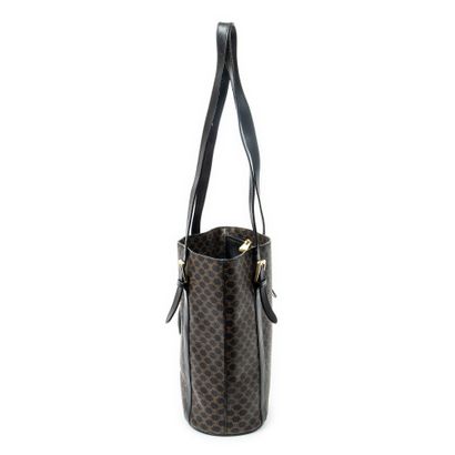 CELINE 
Sac seau en toile marron et noir,...