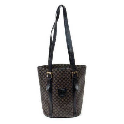 CELINE 
Sac seau en toile marron et noir,...