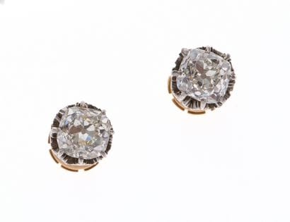 Paire de Boutons d'oreille deux ors 18K 750°/°°...