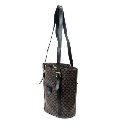 CELINE 
Sac seau en toile marron et noir,...