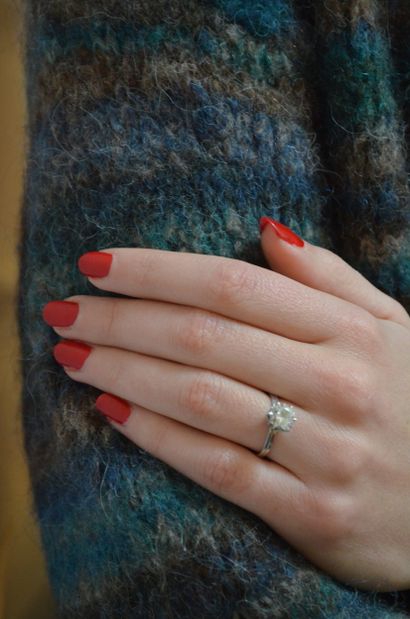 Bague solitaire
en or gris 18K 750°/°° ornée...