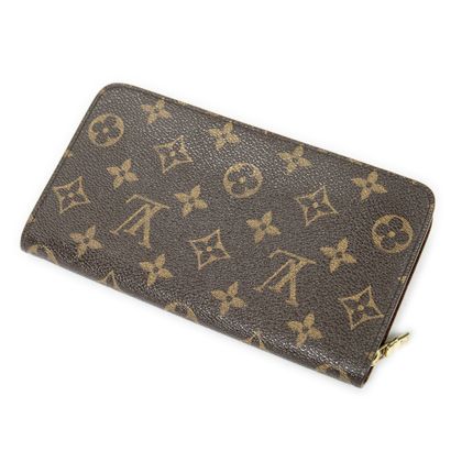 LOUIS VUITTON
Monogram canvas wallet, gilded...