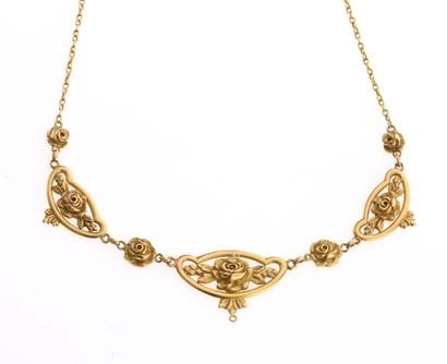 Collier
En or jaune 18K 750/°° à décor de...