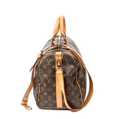 LOUIS VUITTON
Sac modèle 