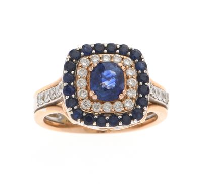 Ring
two 18k 750°/°° golds, the square top...