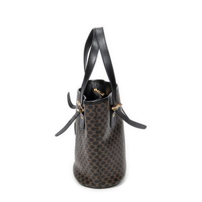CELINE
Vintage bucket bag in black and brown...