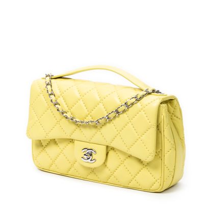CHANEL made in italy
Quilted yellow leather...