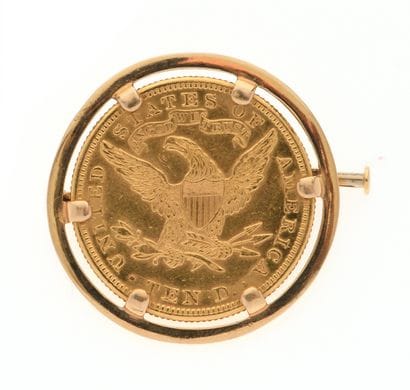18K yellow gold brooch 750/°° set with an...