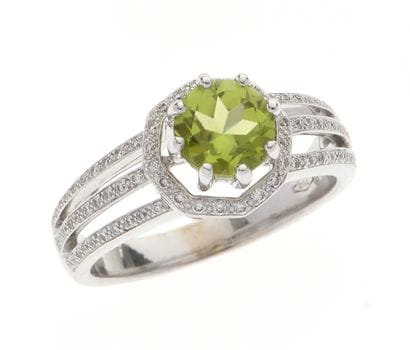 Ring
in openwork 18k white gold centered...