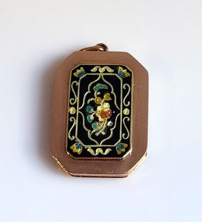 Octagonal keepsake pendant
in 18K 750/°°...